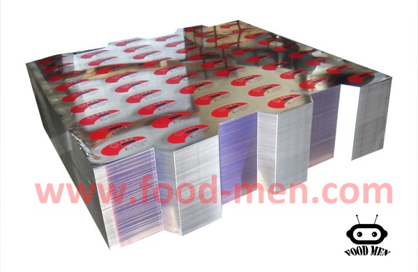 Picture of multiple printed tinplate sheets stacked together
